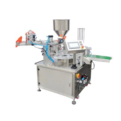 Automatic rotary plate filling and sealing machine