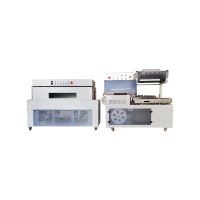 Sealing and shrinking packaging machine