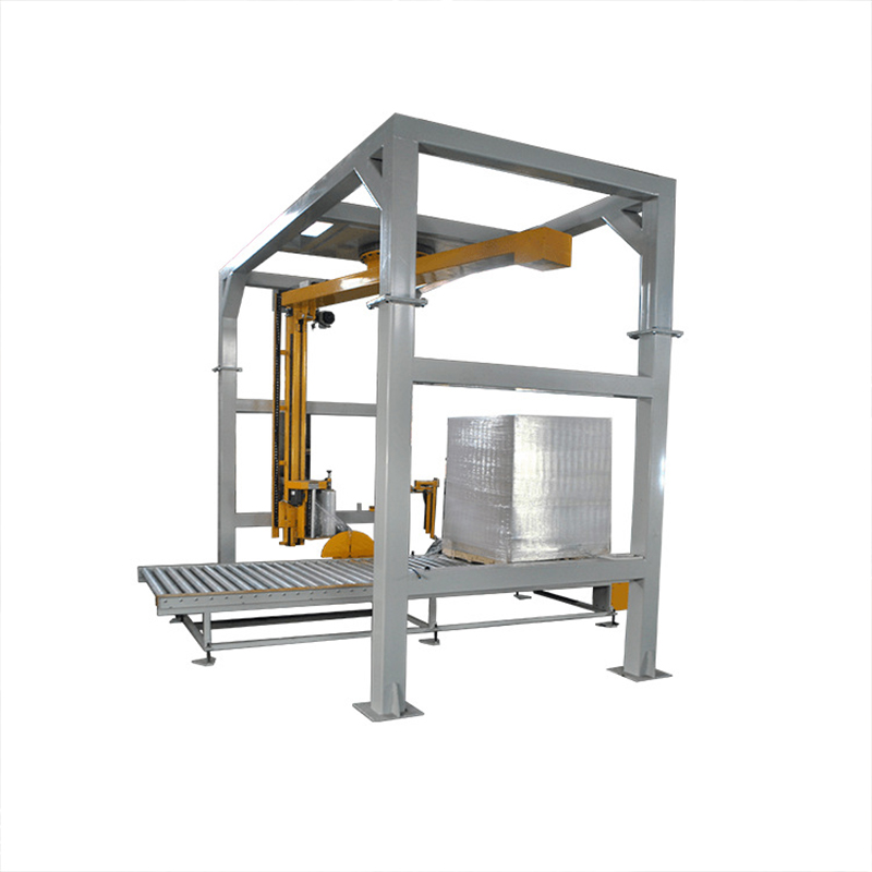 Rocker type wrapping machine