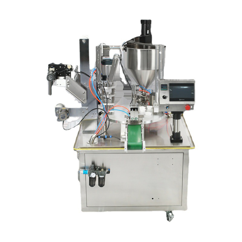 Automatic rotary plate filling and sealing machine