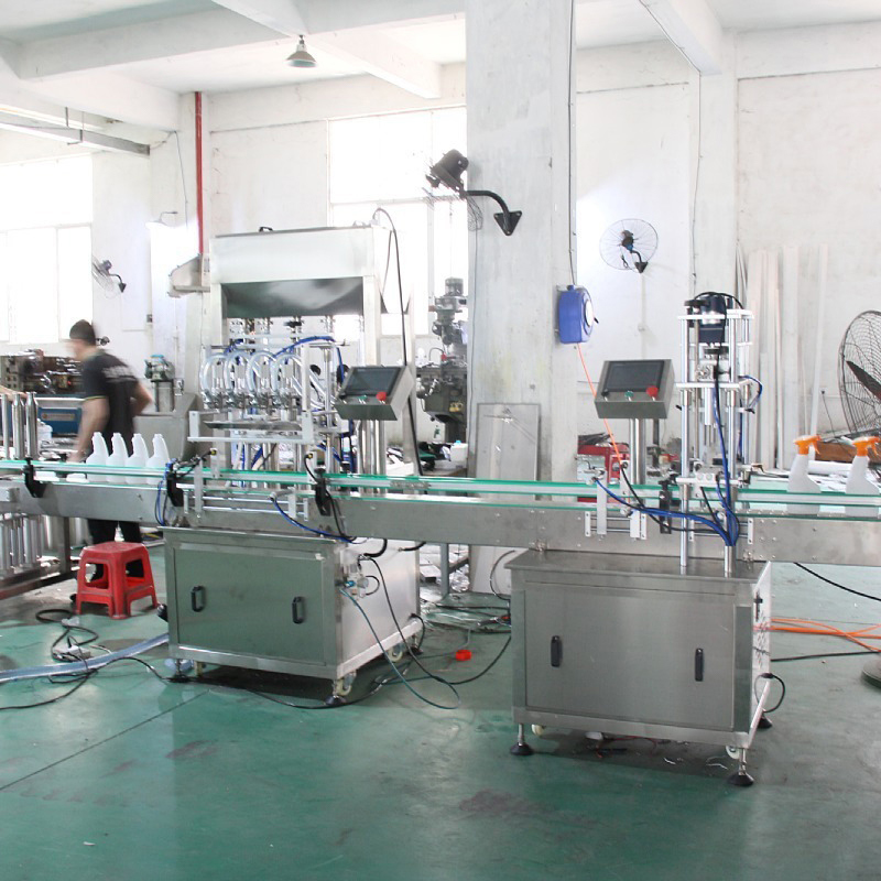 Máquina de parafusar tampas